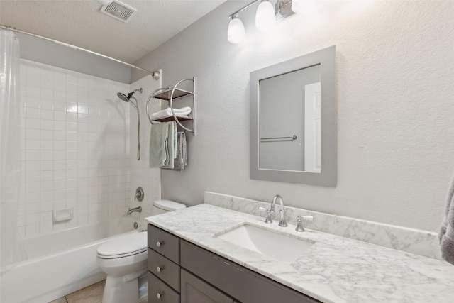 full bathroom with a textured ceiling, toilet, visible vents, vanity, and shower / bath combination with curtain