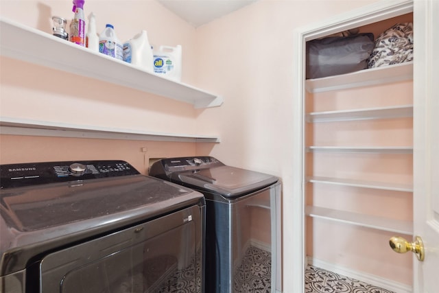 laundry room featuring laundry area and washing machine and dryer