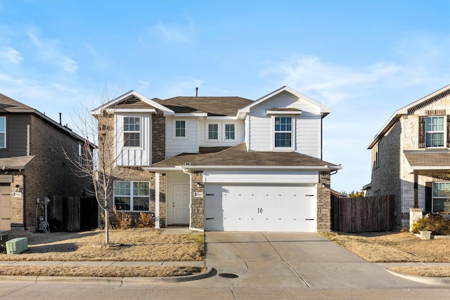 traditional home featuring central AC unit, a garage, brick siding, fence, and concrete driveway