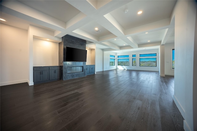 unfurnished living room featuring a premium fireplace, beamed ceiling, coffered ceiling, and baseboards