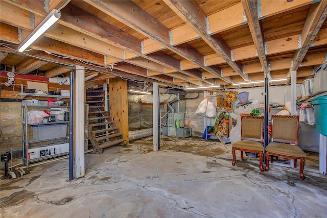 unfinished basement with heating unit