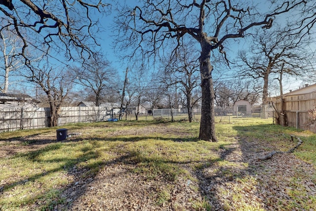 view of yard with a fenced backyard