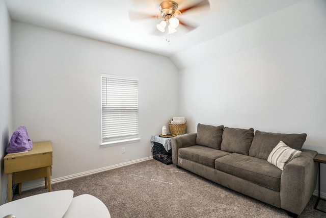 living room with baseboards, a ceiling fan, carpet, and vaulted ceiling