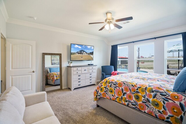 bedroom with baseboards, visible vents, carpet floors, ceiling fan, and crown molding