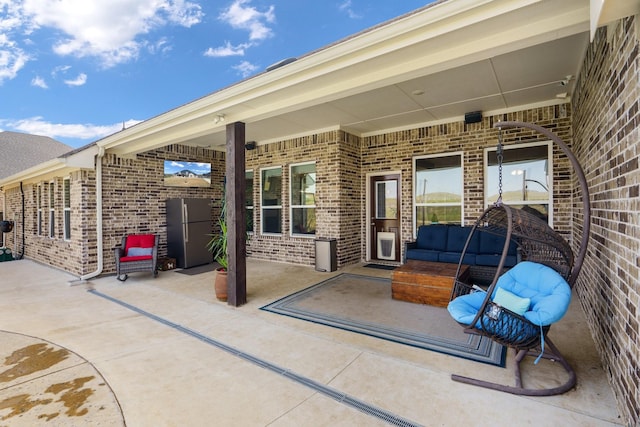 view of patio / terrace with an outdoor hangout area