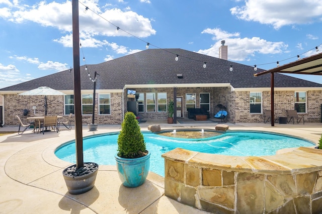 outdoor pool featuring a patio