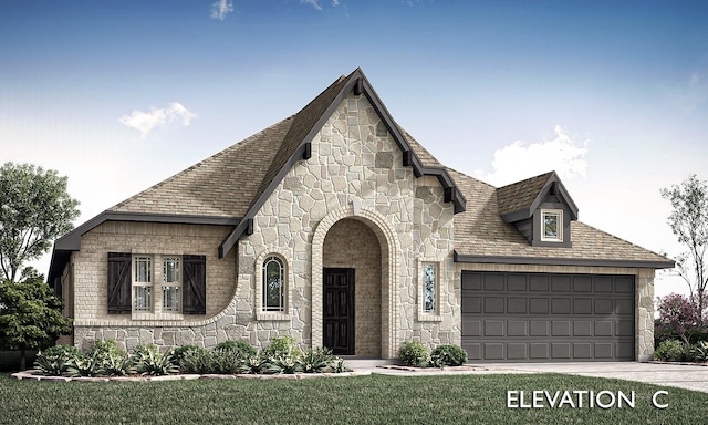 view of front of house with an attached garage, concrete driveway, a front lawn, and stone siding