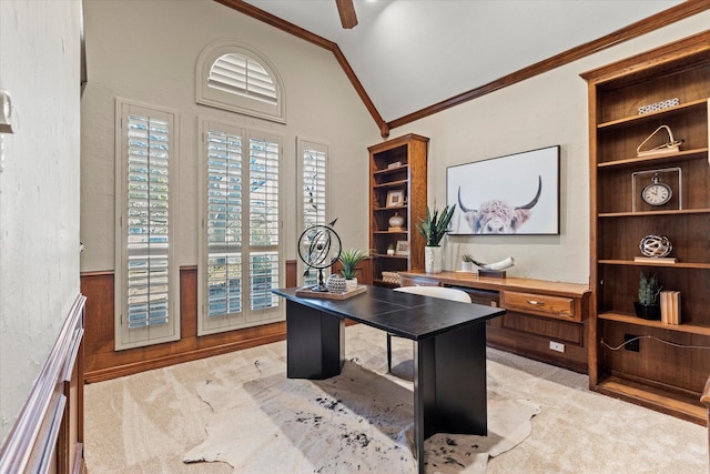 office space featuring high vaulted ceiling, light carpet, crown molding, and ceiling fan