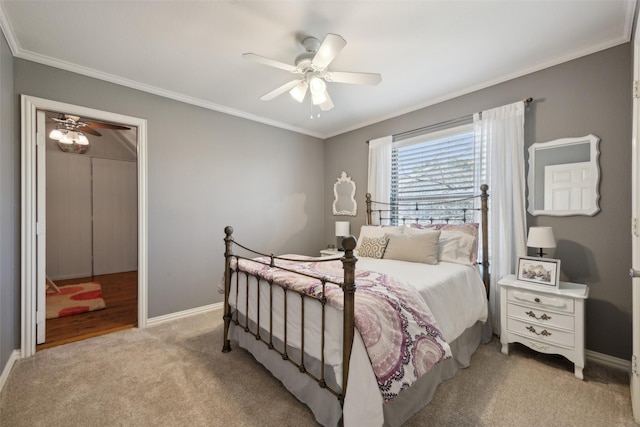 bedroom featuring light carpet, crown molding, baseboards, and ceiling fan