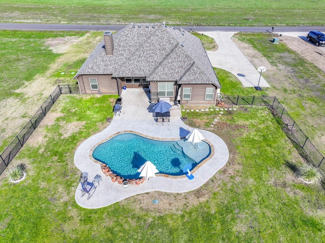 view of swimming pool featuring a fenced backyard, a fenced in pool, and a patio