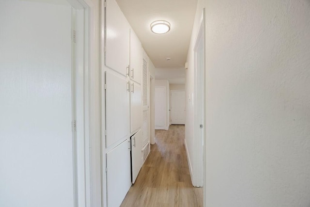 hall featuring light wood finished floors