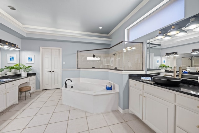 full bath with tile patterned flooring, visible vents, crown molding, and a walk in shower