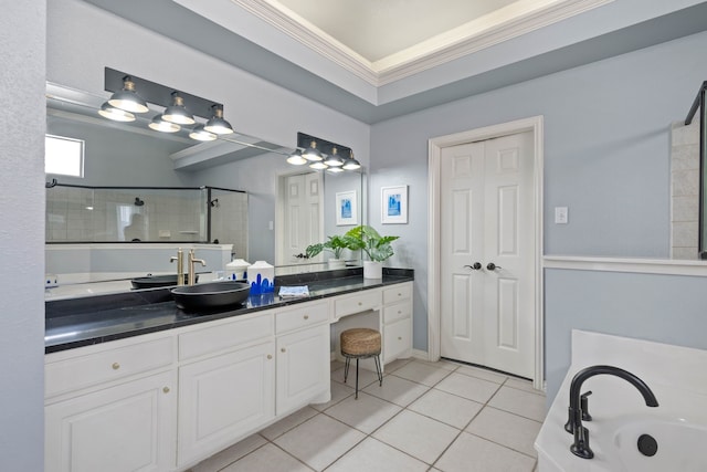 bathroom featuring crown molding, a tile shower, vanity, tile patterned flooring, and a bath