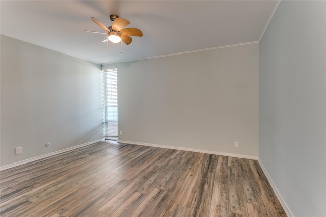 unfurnished room featuring ornamental molding, wood finished floors, a ceiling fan, and baseboards