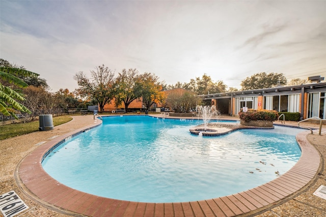 pool featuring fence