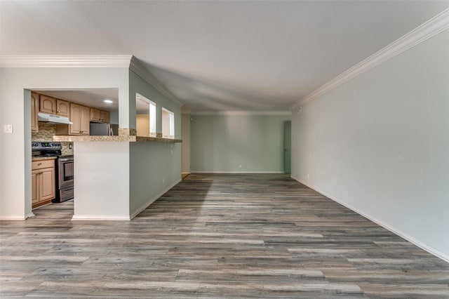 unfurnished living room with crown molding, baseboards, and dark wood-type flooring