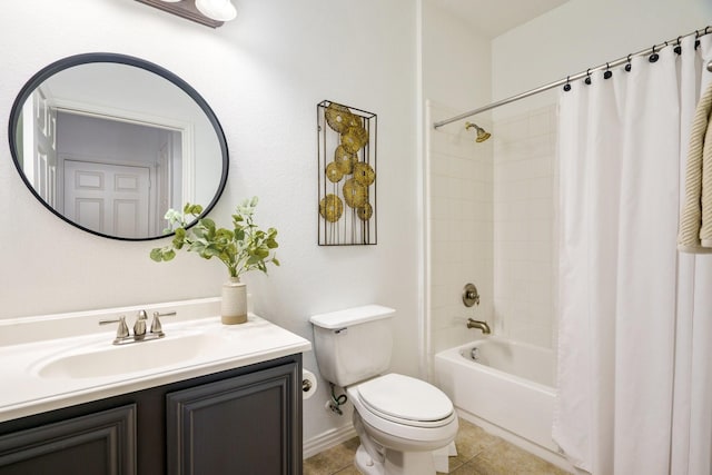 bathroom featuring toilet, vanity, baseboards, tile patterned floors, and shower / bath combination with curtain