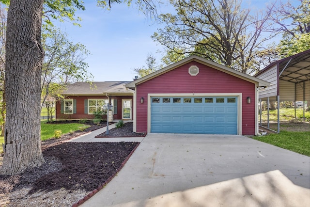 view of front facade featuring driveway and an attached garage