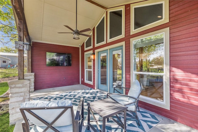 view of patio / terrace featuring ceiling fan