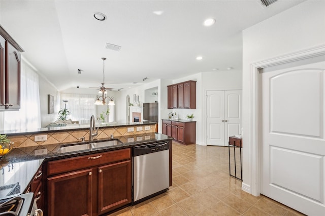 kitchen featuring recessed lighting, visible vents, decorative backsplash, stainless steel dishwasher, and a sink