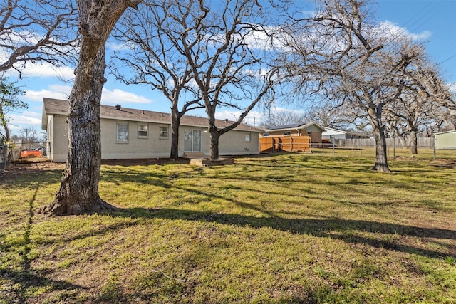 view of yard featuring fence