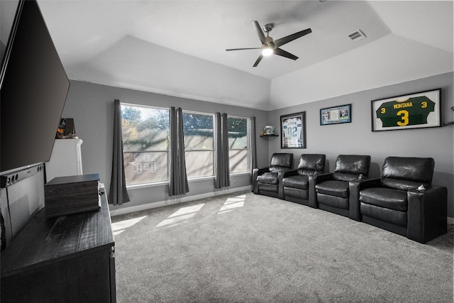 cinema featuring visible vents, carpet flooring, vaulted ceiling, ceiling fan, and baseboards