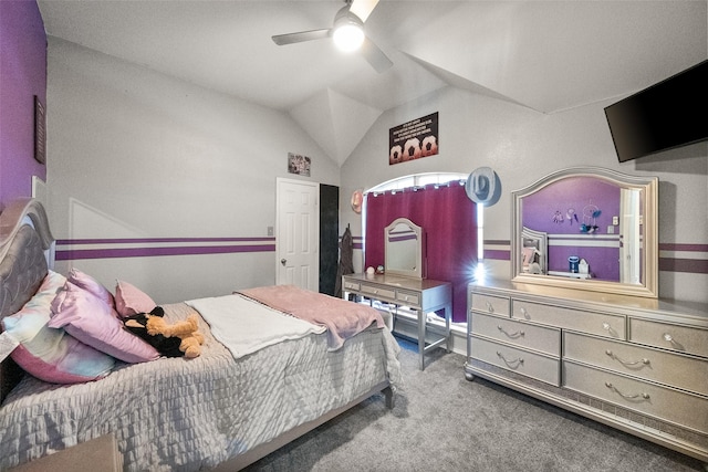 bedroom with carpet floors, ceiling fan, and vaulted ceiling