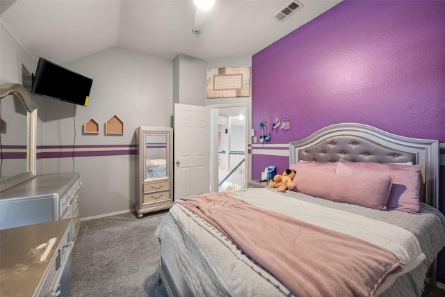 bedroom featuring vaulted ceiling, carpet flooring, visible vents, and baseboards