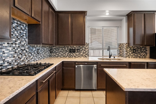 kitchen with a sink, dark brown cabinets, dishwasher, and black gas stovetop