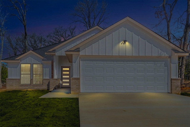 view of front of home with concrete driveway, board and batten siding, and brick siding