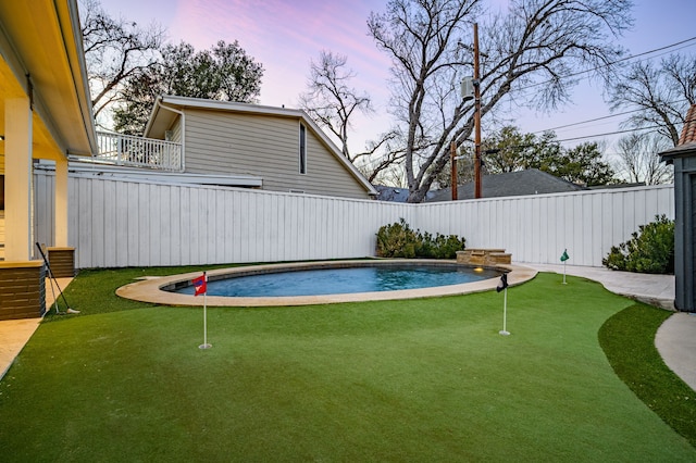 view of pool with fence