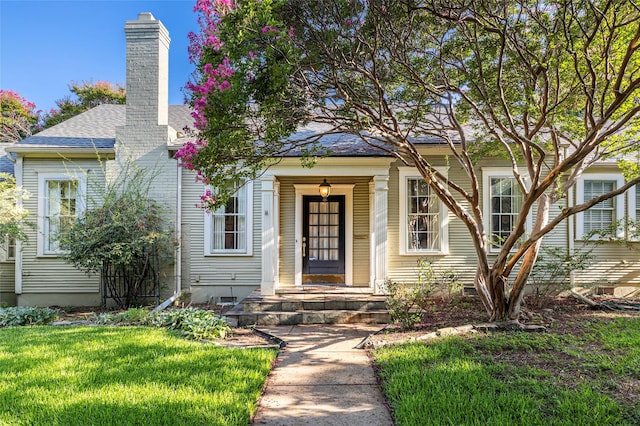 4705 El Campo Ave, Fort Worth, TX 76107 - view of front of property with a shingled roof, a chimney, and a front lawn