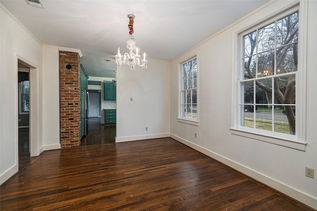 4705 El Campo Ave, Fort Worth, TX 76107 - unfurnished dining area with dark wood-style floors, a healthy amount of sunlight, and ornamental molding