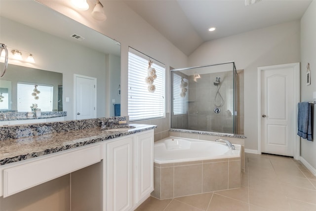 bathroom featuring a garden tub, visible vents, a shower stall, vanity, and tile patterned floors