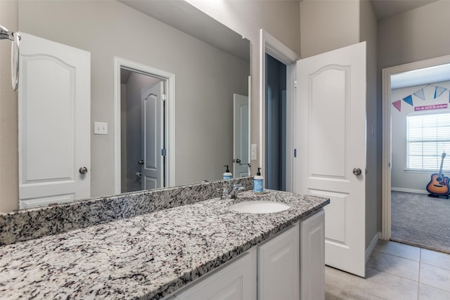 5705 Bender Ridge Dr, Mckinney, TX 75071 - bathroom featuring tile patterned floors, vanity, and baseboards