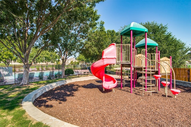 community playground featuring fence