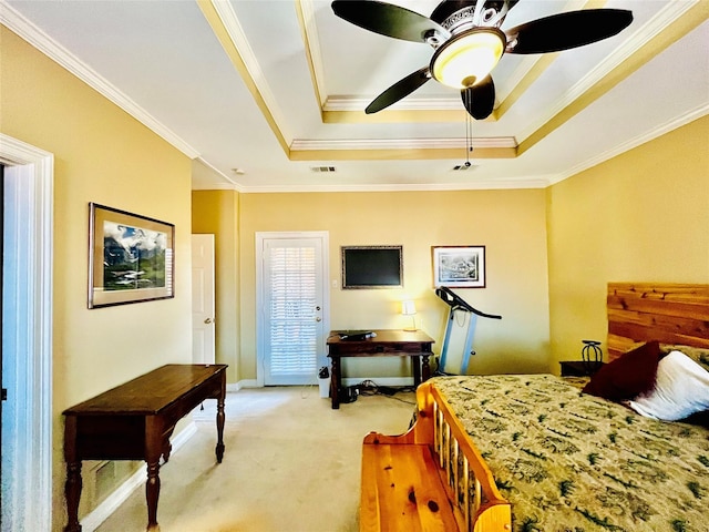 bedroom featuring crown molding, a raised ceiling, visible vents, light carpet, and ceiling fan