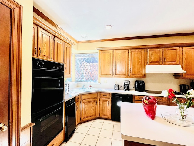 kitchen with brown cabinets, light countertops, light tile patterned flooring, black appliances, and exhaust hood