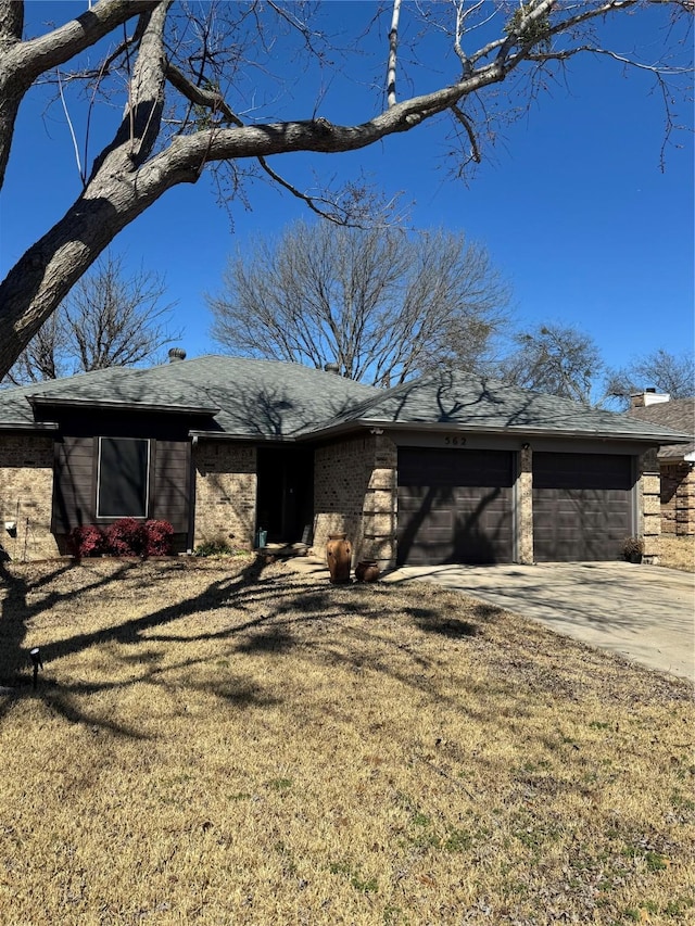 mid-century home with brick siding, roof with shingles, an attached garage, driveway, and a front lawn