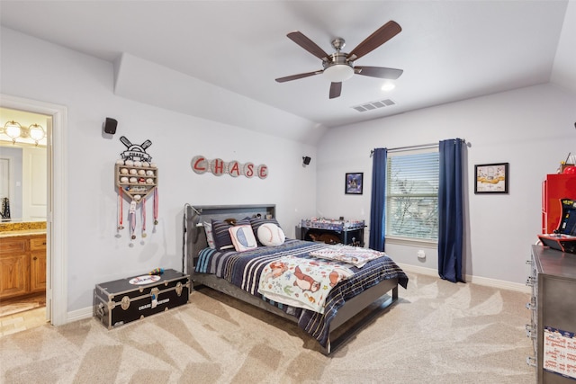 bedroom with lofted ceiling, carpet flooring, and visible vents