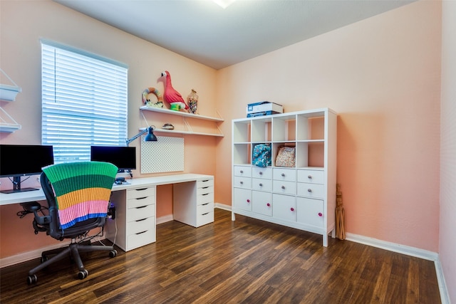 home office featuring wood finished floors and baseboards