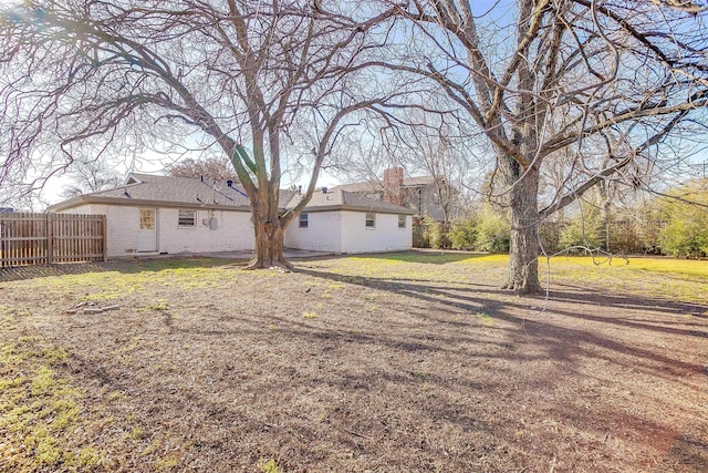 view of yard with fence