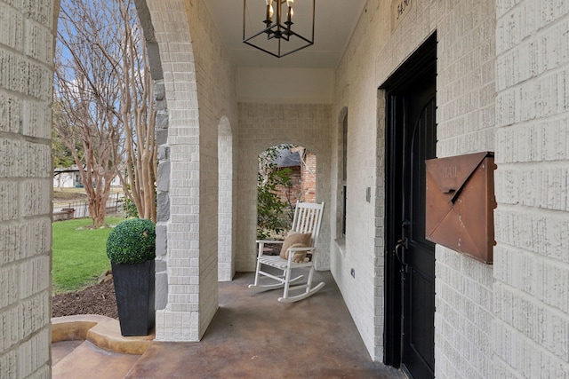 view of patio / terrace featuring ceiling fan and a porch