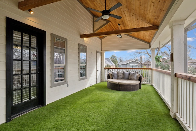 view of yard with ceiling fan