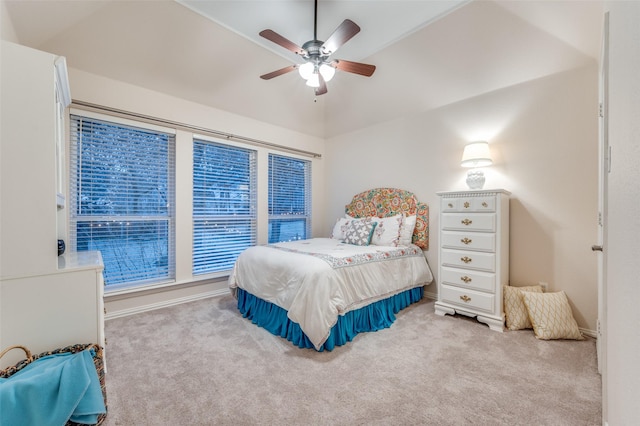 bedroom featuring vaulted ceiling, carpet floors, ceiling fan, and baseboards