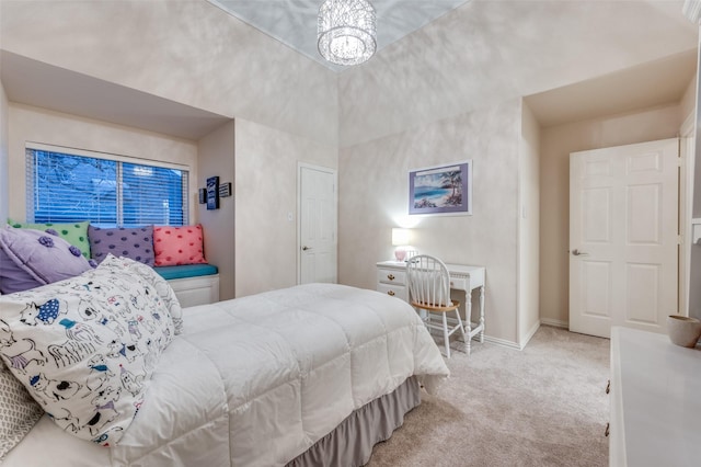 bedroom featuring a towering ceiling, an inviting chandelier, baseboards, and carpet flooring