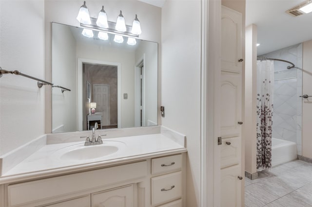 bathroom featuring shower / bathtub combination with curtain, visible vents, and vanity