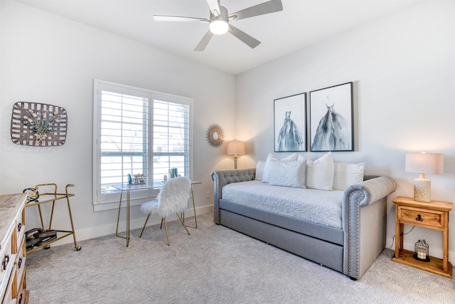 bedroom with ceiling fan, carpet floors, and baseboards