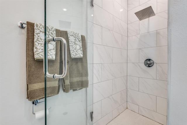 bathroom with a shower stall