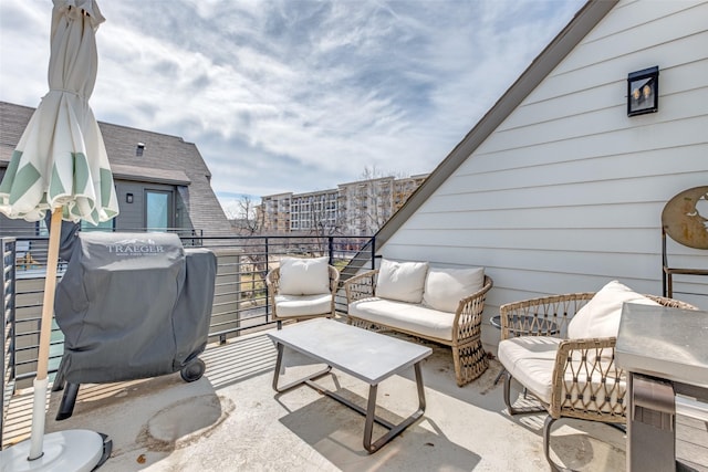 view of patio / terrace featuring a balcony, an outdoor living space, and area for grilling